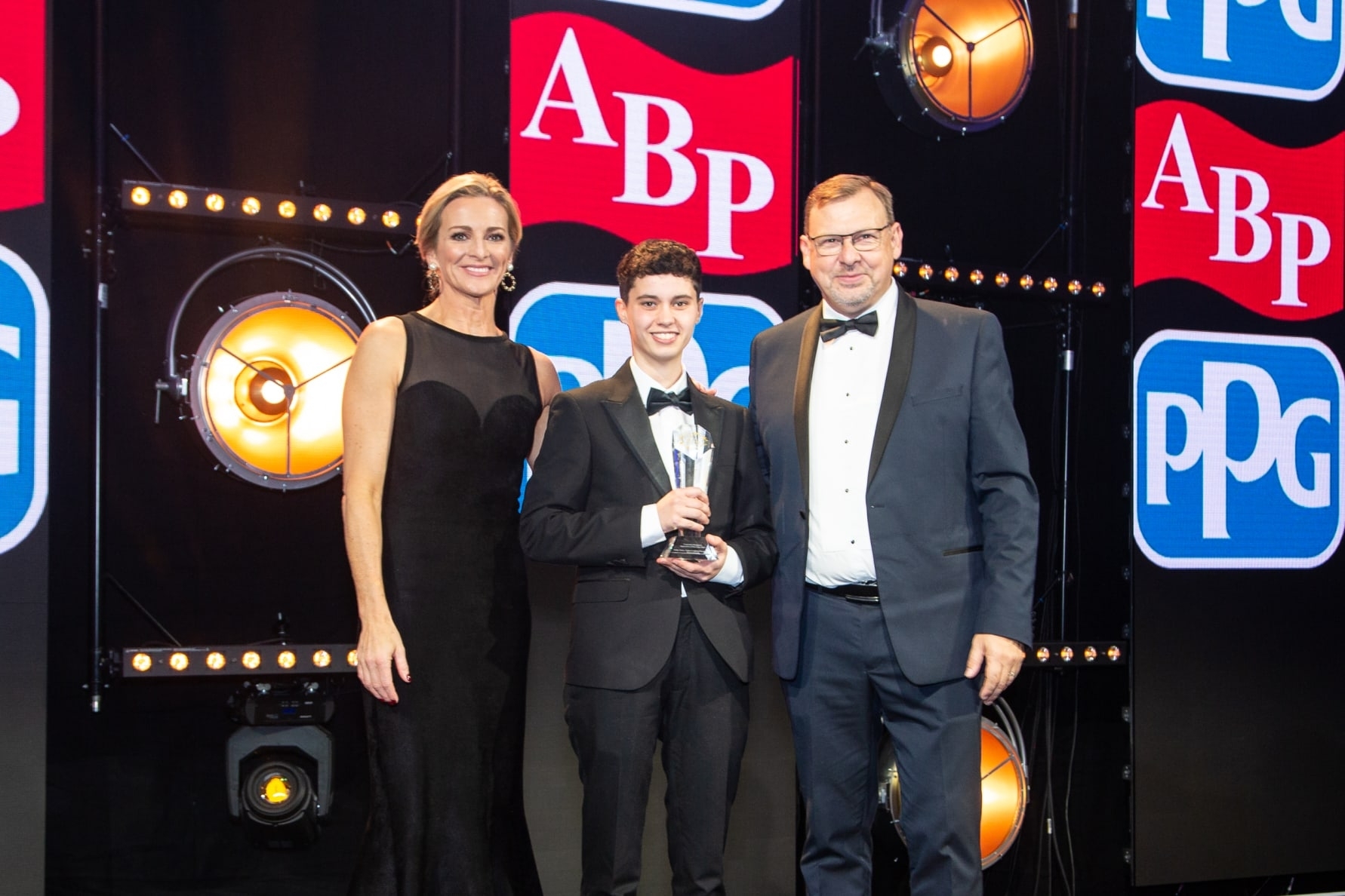 L-R Host Gaby Logan, Apprentice of the Year Kelly Viera Solus, Dean Lander Thatcham Research.jpg