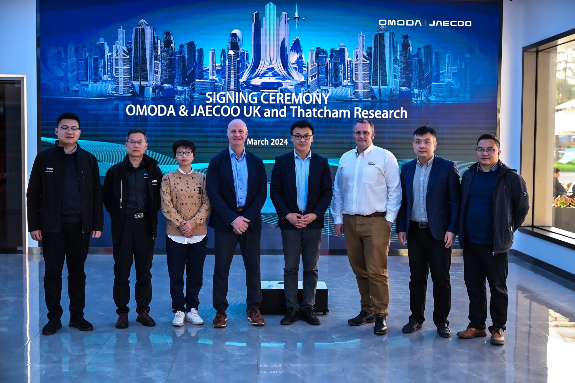 Miller Crockart and Ben Townsend, Thatcham Research with Mr Charlie Zhang VP of Chery Group (centre) and senior members of the Chery team