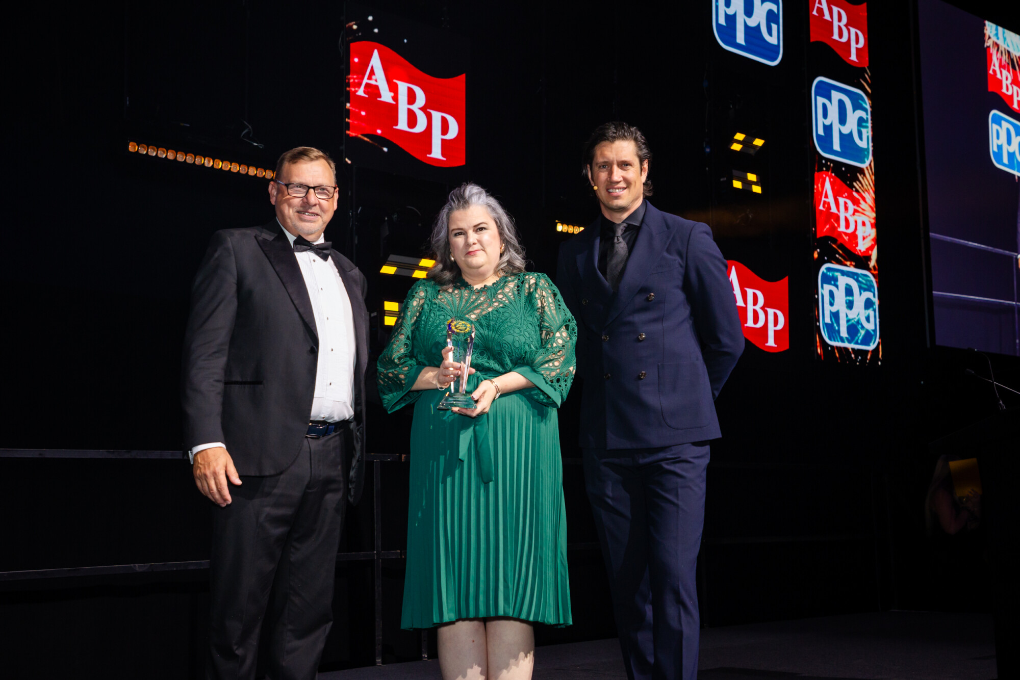 Dean Lander, Thatcham Research, Nicola Sutherland collecting Employer of the Year on behalf of Steer Automotive Group and Vernon Kay
